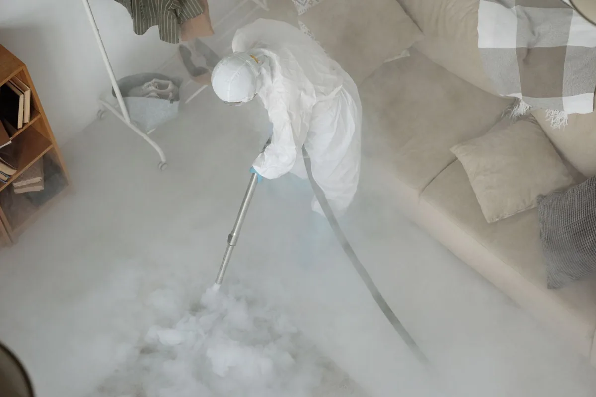 Biohazard cleanup technician in protective equipment, South Yarmouth, MA